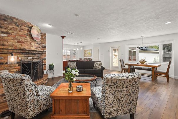 Dining room, Fireplace, Interior, Living room, Pendant Lights, Recessed Lighting, Stone Walls, Wood Texture Flooring