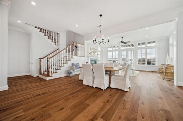 Chandelier, Dining room, Fireplace, Interior, Pendant Lights, Recessed Lighting, Wood Texture Flooring