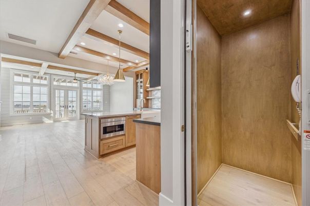Chandelier, Interior, Kitchen, Pendant Lights, Recessed Lighting, Stainless Steel Appliances, Wooden Beams, Wood Texture Flooring