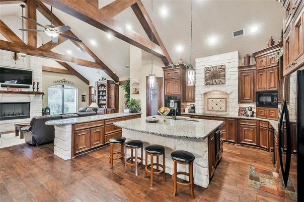 Fireplace, Interior, Kitchen, Living room, Pendant Lights, Recessed Lighting, Stone Walls, Wooden Beams, Wood Texture Flooring