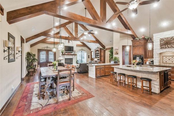 Dining room, Fireplace, Interior, Kitchen, Living room, Pendant Lights, Recessed Lighting, Stone Walls, Wooden Beams, Wood Texture Flooring