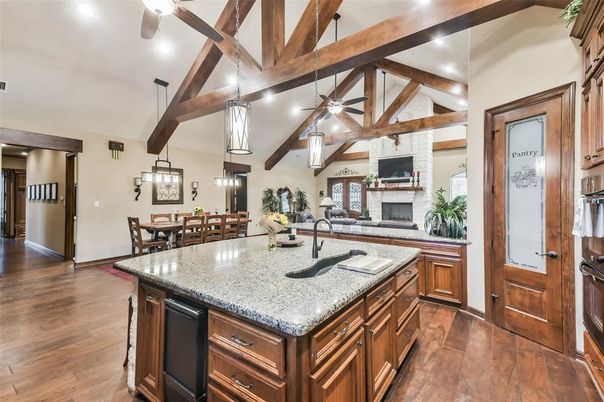 Dining room, Fireplace, Interior, Kitchen, Pendant Lights, Recessed Lighting, Wooden Beams, Wood Texture Flooring