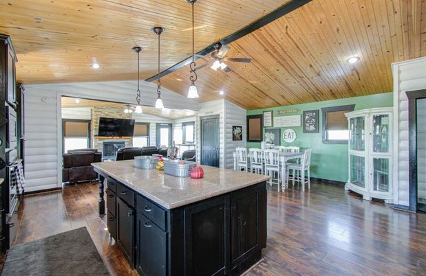 Dining room, Fireplace, Interior, Kitchen, Living room, Pendant Lights, Recessed Lighting, Wooden Ceilings, Wood Texture Flooring