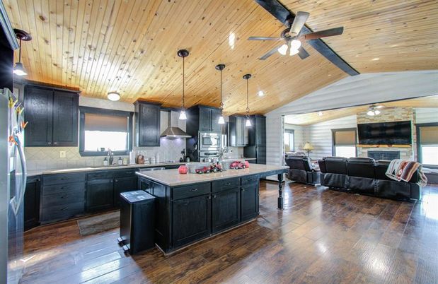 Interior, Kitchen, Living room, Pendant Lights, Recessed Lighting, Stainless Steel Appliances, Stone Walls, Wooden Ceilings, Wood Texture Flooring