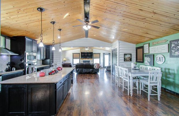 Dining room, Fireplace, Interior, Kitchen, Living room, Pendant Lights, Recessed Lighting, Stainless Steel Appliances, Wooden Ceilings, Wood Texture Flooring