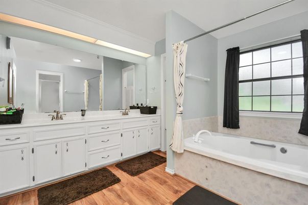 Bathroom, Dual Sink Vanities, Interior, Recessed Lighting, Wood Texture Flooring