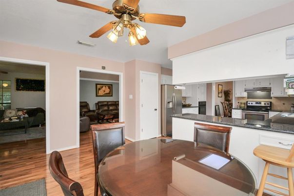Dining room, Interior, Kitchen, Living room, Stainless Steel Appliances, Wood Texture Flooring
