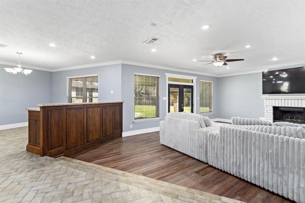 Chandelier, Fireplace, Interior, Living room, Recessed Lighting, Wood Texture Flooring