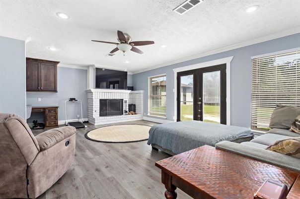 Bedroom, Fireplace, Interior, Living room, Recessed Lighting, Wood Texture Flooring