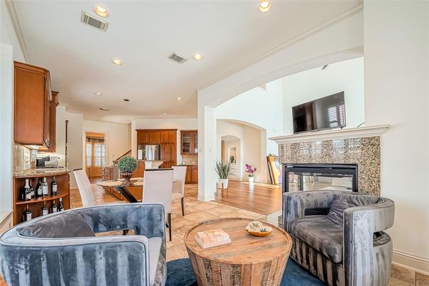 Dining room, Fireplace, Interior, Living room, Recessed Lighting, Wood Texture Flooring