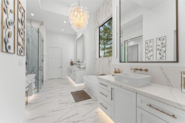 Bathroom, Chandelier, Dual Sink Vanities, Glass Shower, Interior, Marble, Marble Walls, Pendant Lights, Recessed Lighting