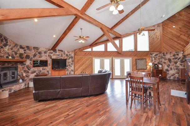 Dining room, Fireplace, Interior, Living room, Recessed Lighting, Wooden Beams, Wood Texture Flooring, Wooden Walls