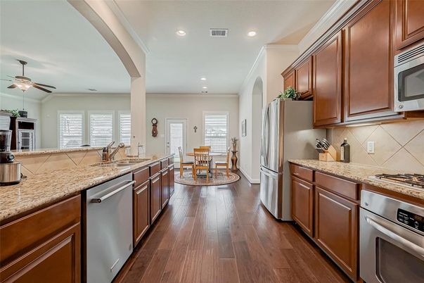 Dining room, Interior, Kitchen, Recessed Lighting, Stainless Steel Appliances, Wood Texture Flooring