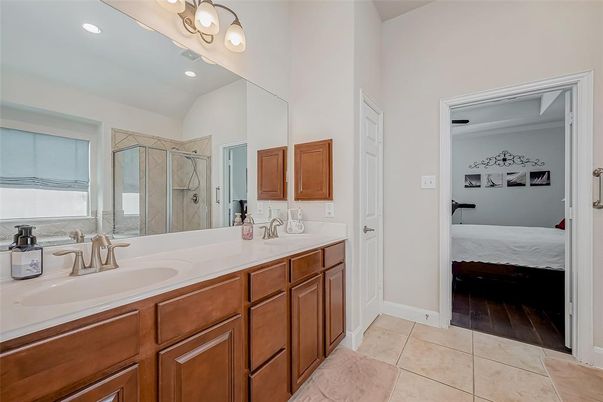 Bathroom, Dual Sink Vanities, Glass Shower, Interior, Recessed Lighting, Wood Texture Flooring
