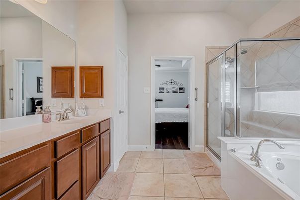 Bathroom, Bedroom, Dual Sink Vanities, Glass Shower, Interior, Wood Texture Flooring