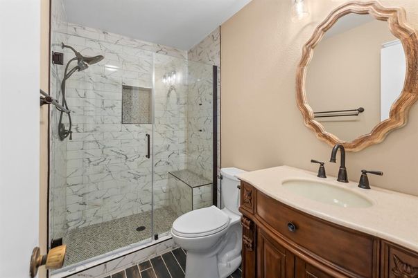 Bathroom, Glass Shower, Interior, Marble Walls, Wood Texture Flooring