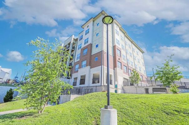 Backyard, Exterior, Facade, Brick Facade, Condo Building