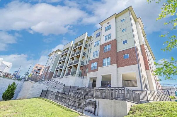 Exterior, Facade, Brick Facade, Condo Building
