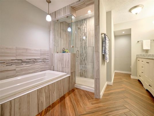 Bathroom, Glass Shower, Interior, Pendant Lights, Recessed Lighting, Wood Texture Flooring
