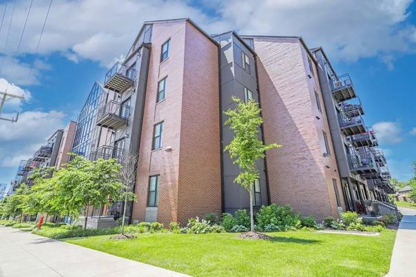 Exterior, Facade, Brick Facade, Condo Building