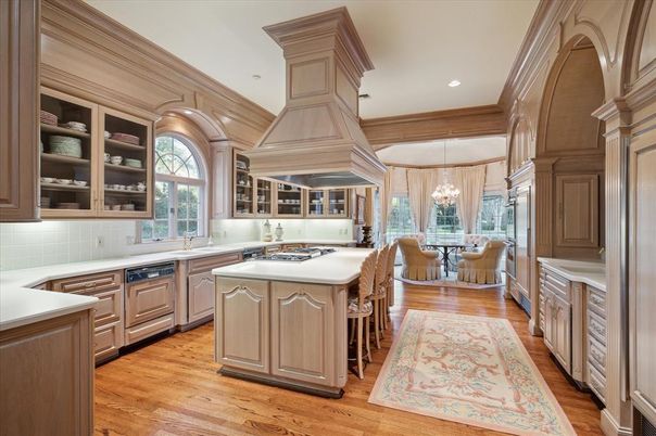 Chandelier, Dining room, Interior, Kitchen, Pendant Lights, Recessed Lighting, Stainless Steel Appliances, Wood Texture Flooring