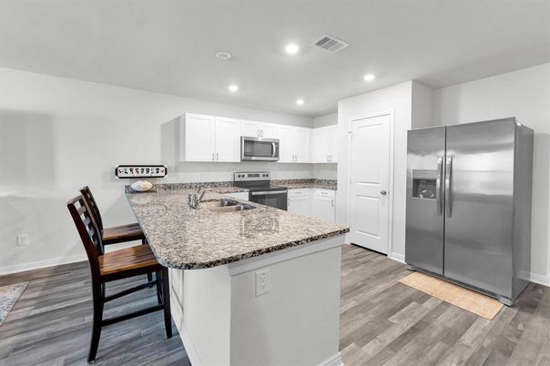 Interior, Kitchen, Recessed Lighting, Stainless Steel Appliances, Wood Texture Flooring