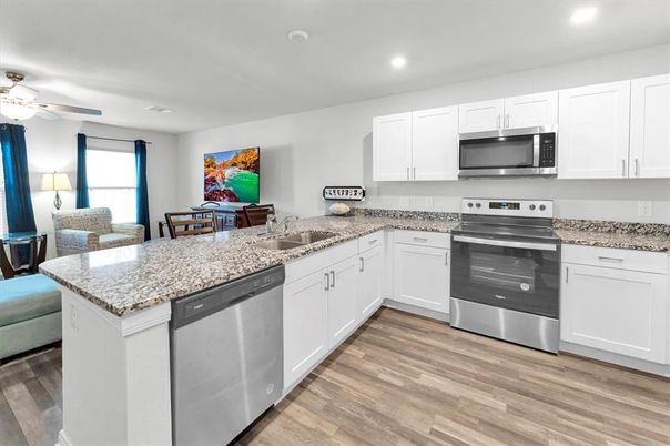 Dining room, Interior, Kitchen, Recessed Lighting, Stainless Steel Appliances, Wood Texture Flooring
