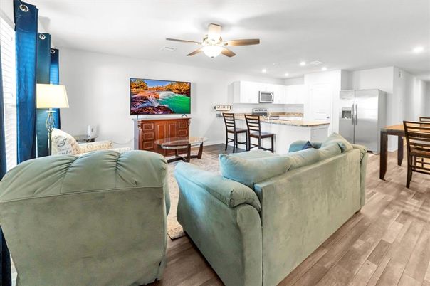 Dining room, Interior, Kitchen, Living room, Recessed Lighting, Stainless Steel Appliances, Wood Texture Flooring