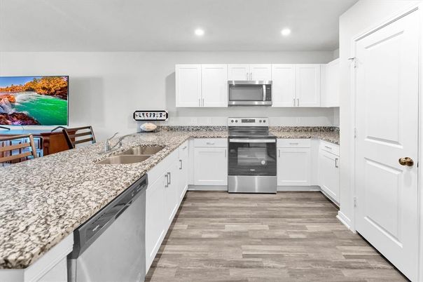 Interior, Kitchen, Recessed Lighting, Stainless Steel Appliances, Wood Texture Flooring