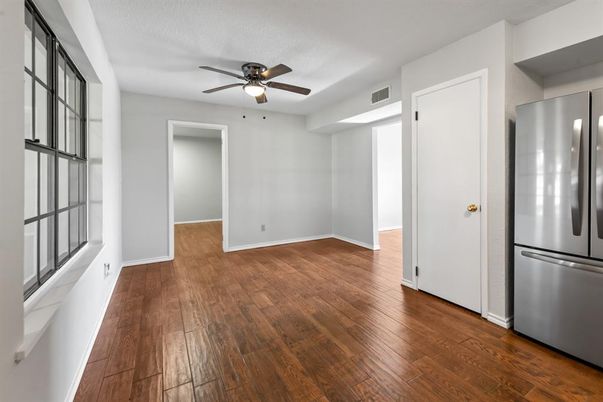 Empty room, Interior, Kitchen, Stainless Steel Appliances, Wood Texture Flooring