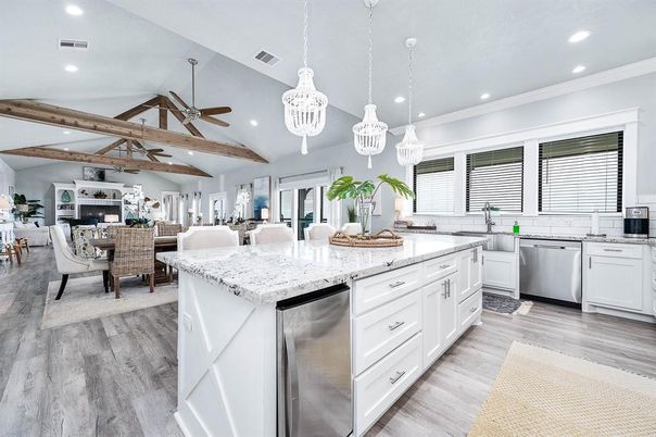 Dining room, Interior, Kitchen, Living room, Pendant Lights, Recessed Lighting, Stainless Steel Appliances, Wooden Beams, Wood Texture Flooring