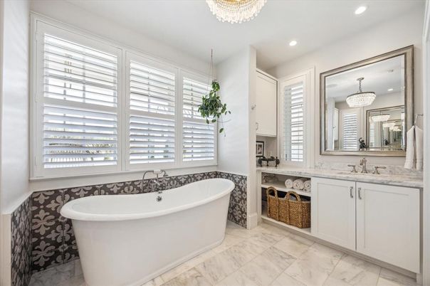 Bathroom, Chandelier, Dual Sink Vanities, Free Standing Baths, Interior, Marble, Recessed Lighting