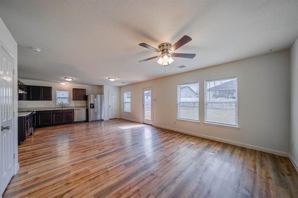 Empty room, Interior, Kitchen, Stainless Steel Appliances, Wood Texture Flooring