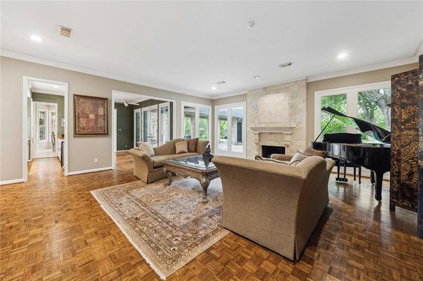 Fireplace, Interior, Living room, Piano, Recessed Lighting, Wood Texture Flooring
