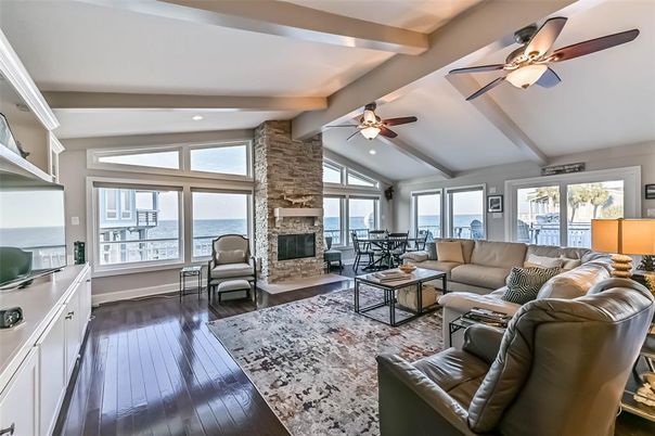 Fireplace, Interior, Living room, Recessed Lighting, Stone Walls, Water, Wood Texture Flooring