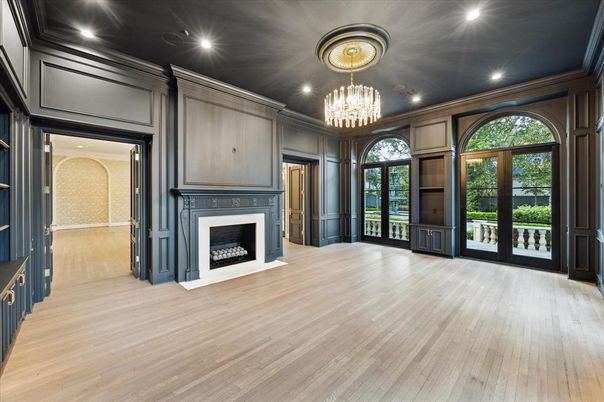 Chandelier, Empty room, Fireplace, Interior, Recessed Lighting, Wood Texture Flooring