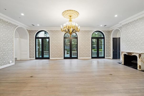 Chandelier, Empty room, Fireplace, Interior, Recessed Lighting, Wood Texture Flooring