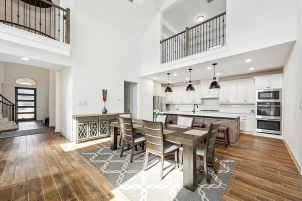 Dining room, Interior, Kitchen, Pendant Lights, Recessed Lighting, Stainless Steel Appliances, Wood Texture Flooring