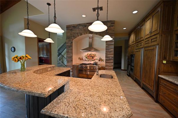 Interior, Kitchen, Pendant Lights, Recessed Lighting, Stainless Steel Appliances, Stone Walls, Wood Texture Flooring