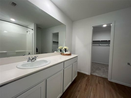 Bathroom, Dual Sink Vanities, Interior, Recessed Lighting, Wood Texture Flooring