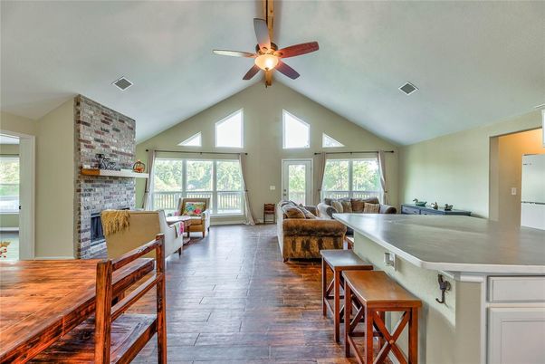 Dining room, Fireplace, Interior, Living room, Stone Walls, Wood Texture Flooring