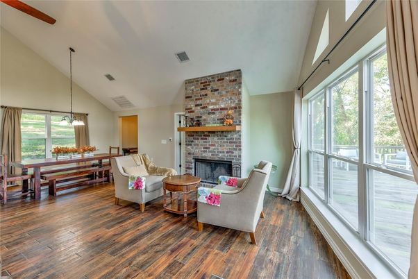 Dining room, Fireplace, Interior, Living room, Pendant Lights, Stone Walls, Wood Texture Flooring