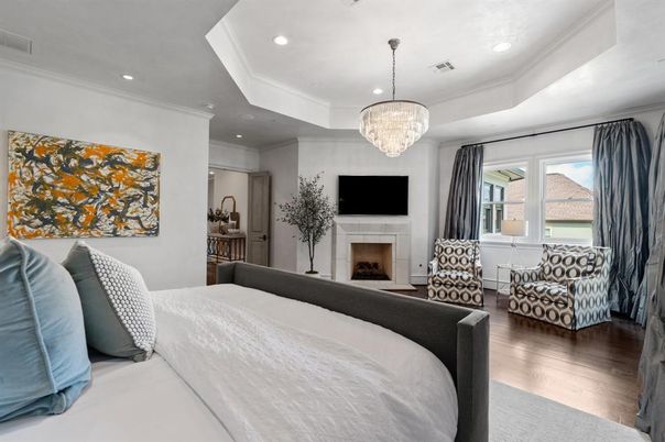 Bedroom, Chandelier, Fireplace, Interior, Recessed Lighting, Wood Texture Flooring