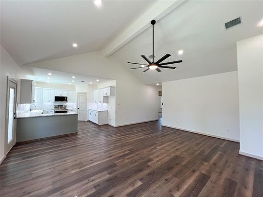 Empty room, Interior, Kitchen, Pendant Lights, Recessed Lighting, Stainless Steel Appliances, Wood Texture Flooring
