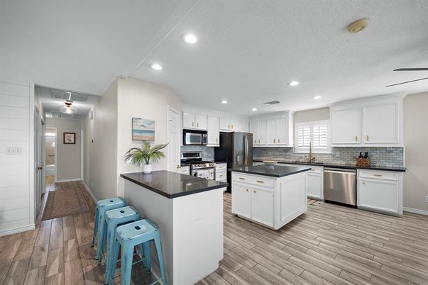 Interior, Kitchen, Recessed Lighting, Stainless Steel Appliances, Wood Texture Flooring