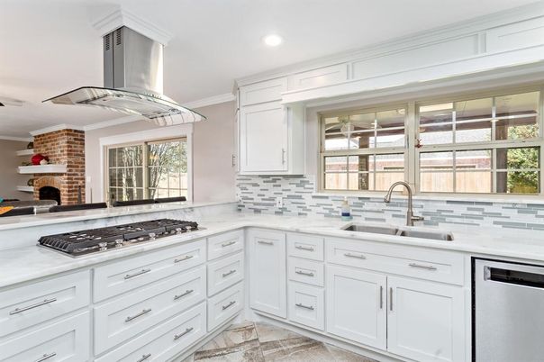 Fireplace, Interior, Kitchen, Recessed Lighting, Stainless Steel Appliances, Stone Walls
