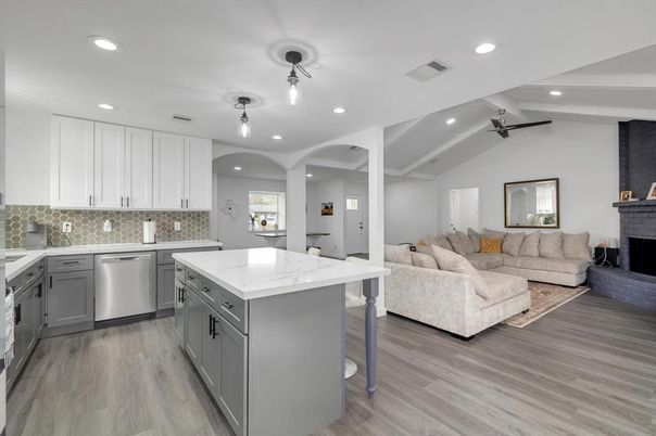 Fireplace, Interior, Kitchen, Living room, Recessed Lighting, Stainless Steel Appliances, Wood Texture Flooring