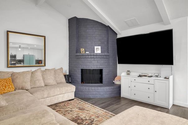 Fireplace, Interior, Living room, Recessed Lighting, Stone Walls, Wood Texture Flooring