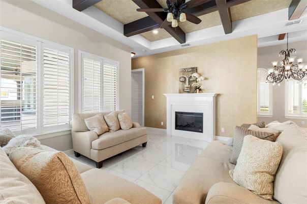 Chandelier, Fireplace, Interior, Living room, Marble, Recessed Lighting, Wooden Beams