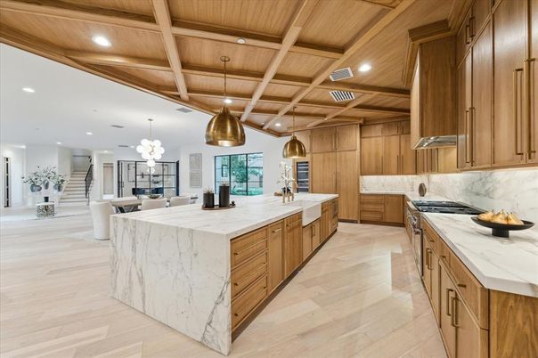 Chandelier, Dining room, Interior, Kitchen, Living room, Pendant Lights, Recessed Lighting, Stainless Steel Appliances, Wooden Beams, Wooden Ceilings, Wood Texture Flooring